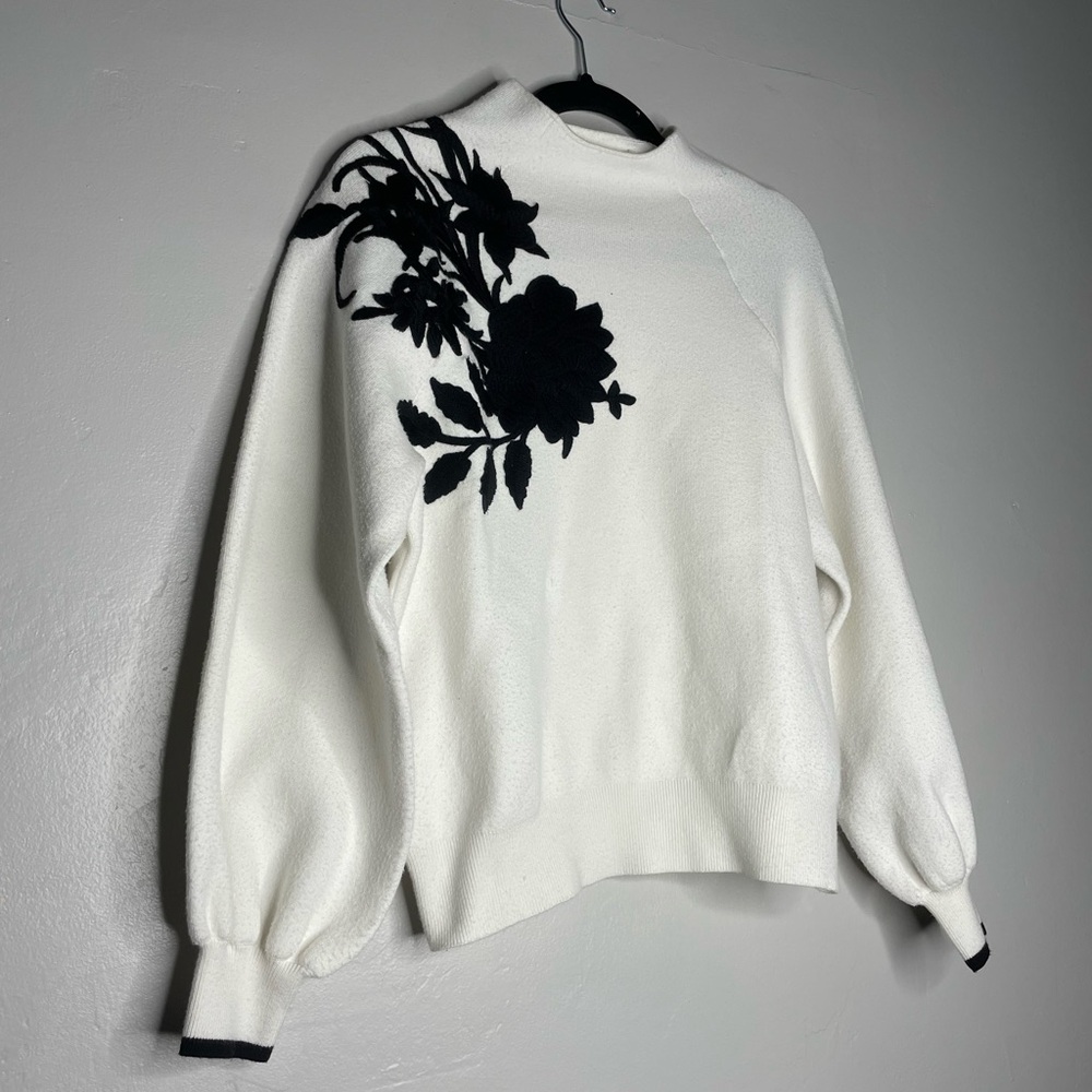 Anthropologie Mock Neck Cream And Black Floral Knot Sweater